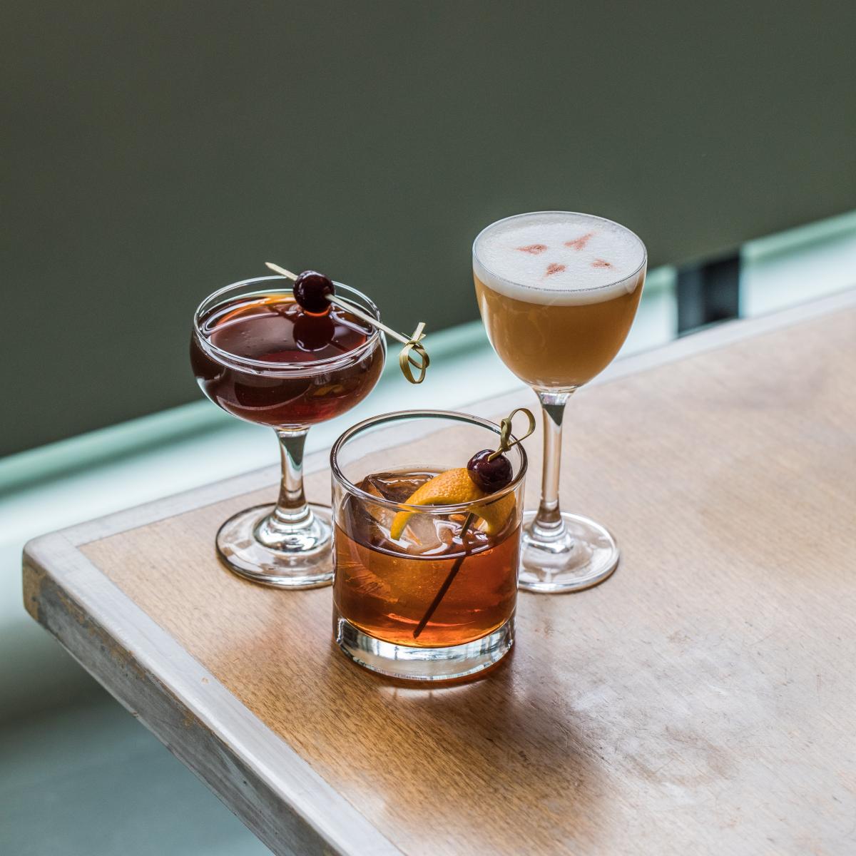 Trio of cocktails on table 
