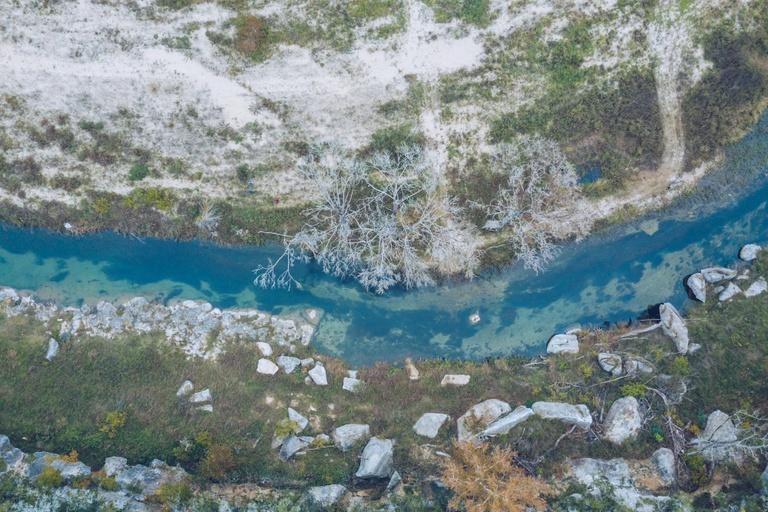 Overview of a river running through baron land 